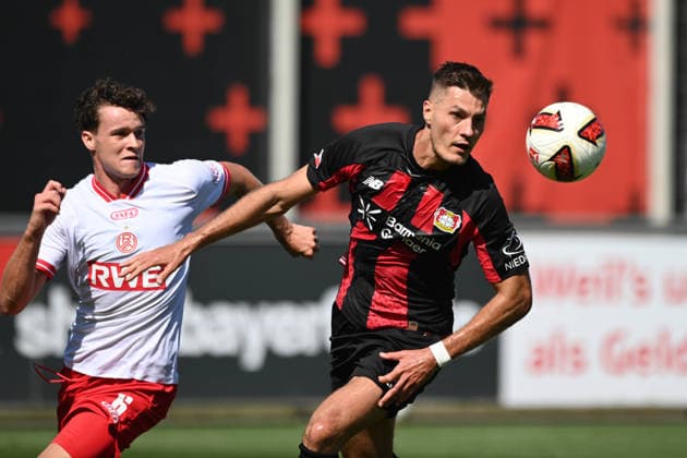 Patrik SCHICK (LEV) gegen Ahmet ARSLAN (RWE) Aktion, Zweikampf, Fussball 1. Bundesliga, Testspiel, testmatch, friendly match, Freundschaftsspiel, Bayer Leverkusen (LEV) - Rot Weiss Essen am 01.08.2026 in Leverkusen Deutschland. DFL regulations prohibit any use of photographs as image sequences and or quasi-video Â *** Patrik SCHICK (LEV) vs. Ahmet ARSLAN (RWE) Action, Tackle, Soccer 1st Bundesliga, Test Match, Test Match, Friendly Match, Bayer Leverkusen (LEV) vs. Rot-Weiss Essen on August 1, 2026, in Leverkusen, Germany. DFL regulations prohibit any use of photographs as image sequences and or quasi-video.