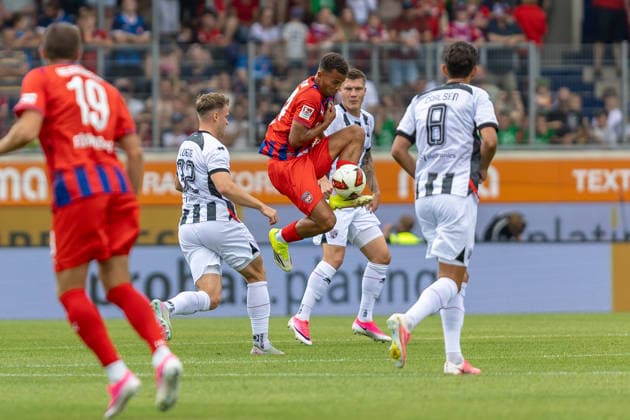 Marcel Costly (1.FC Heidenheim, 24) Ballannahme in der Luft Zweikampf Simon Lorenz (FC Ingolstadt 04, 32) Fredrik Carlsen (FC Ingolstadt 04, 08), GER, 1. FC Heidenheim vs. FC Ingolstadt, Fußball, Max-Liebhaber-Pokal, 2026 2027, 01.08.2026, DFL DFB REGULATIONS PROHIBIT ANY USE OF PHOTOGRAPHS AS IMAGE SEQUENCES AND OR QUASI-VIDEO, GER, 1. FC Heidenheim vs. FC Ingolstadt, Fußball, Max-Liebhaber-Pokal, 2026 2027, 01.08.2026 Heidenheim *** Marcel Costly, 1 FC Heidenheim, 24: Airball control, tackle against Simon Lorenz, FC Ingolstadt 04, 32: Fredrik Carlsen, FC Ingolstadt 04, 08, GER, 1 FC Heidenheim vs. FC Ingolstadt, Soccer, Max Liebhaber Cup, 2026–2027, August 1, 2026, DFL and DFB regulations prohibit any use of photographs as image sequences and or quasi-video, GER, 1 FC Heidenheim vs. FC Ingolstadt, soccer, Max Liebhaber Cup, 2026–2027, August 1, 2026, Heidenheim Copyright: xEibner-Pressefoto JanixPlessx EP_JPL