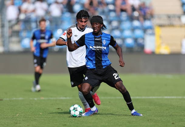 01.08.2026, Fussball Testspiel, SV Waldhof Mannheim - Eintracht Frankfurt, emspor, bespor, sespor, v.l., Can Uzun (Eintracht Frankfurt), Jidechi Okeke (SV Waldhof Mannheim) DFL DFB REGULATIONS PROHIBIT ANY USE OF PHOTOGRAPHS AS IMAGE SEQUENCES AND OR QUASI-VIDEO. xdcx *** August 1, 2026, Soccer Friendly Match, SV Waldhof Mannheim vs. Eintracht Frankfurt, emspor, bespor, sespor, v l, Can Uzun (Eintracht Frankfurt), Jidechi Okeke (SV Waldhof Mannheim). DFL and DFB regulations prohibit any use of photographs as image sequences and or quasi-video. xdcx Copyright: HMBxMedia Claus