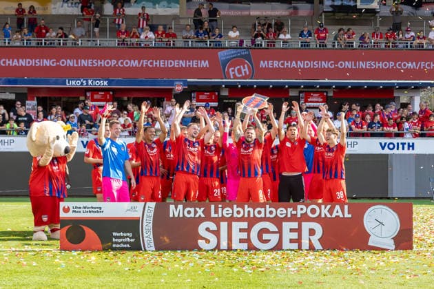 Marnon Busch (1.FC Heidenheim, 02) streckt den Pokal in die Hoeher Emotionen Jubel Feier Team, GER, 1. FC Heidenheim vs. FC Ingolstadt, Fußball, Max-Liebhaber-Pokal, 2026 2027, 01.08.2026, DFL DFB REGULATIONS PROHIBIT ANY USE OF PHOTOGRAPHS AS IMAGE SEQUENCES AND OR QUASI-VIDEO, GER, 1. FC Heidenheim vs. FC Ingolstadt, Fußball, Max-Liebhaber-Pokal, 2026 2027, 01.08.2026 Heidenheim *** Marnon Busch, 1 FC Heidenheim, 02, raises the trophy high; emotions, celebration, team, GER, 1 FC Heidenheim vs. FC Ingolstadt, soccer, Max Liebhaber Cup, 2026–2027, August 1, 2026, DFL and DFB regulations prohibit any use of photographs as image sequences and or quasi-video, GER, 1 FC Heidenheim vs. FC Ingolstadt, Soccer, Max Liebhaber Cup, 2026–2027, August 1, 2026, Heidenheim Copyright: xEibner-Pressefoto JanixPlessx EP_JPL