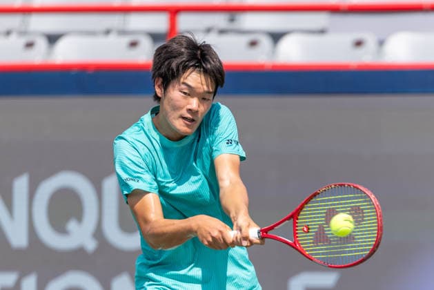 August 1, 2026, Montreal, Quebec, Canada: MICHEAL ZHENG from USA back hand in is match against Kei Nishikori from Japan in qualifying round at Canadian Open at IGA stadium in Montreal, Quebec, Canada on 2026-08-01 Montreal Canada - ZUMAl189 20260801_zsp_l189_013 Copyright: xYannickxLegarex