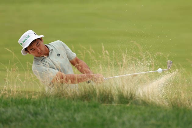 Rocket Classic DETROIT, MICHIGAN - AUGUST 1: Zecheng Dou of People™s Republic of China hits out of the bunker toward the fourth green during the third round of the Rocket Classic 2026 at the Detroit Country Club in Detroit, Michigan, MI, USA Saturday, August 1, 2026. Detroit Michigan United States  Copyright: xJorgexLemusx originalFilename:lemus-rocketcl260801_npm9u.jpg