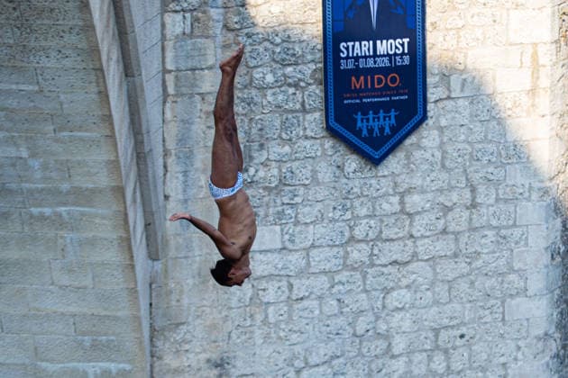 Red Bull Cliff Diving spectacle draws thousands of spectators to Mostar MOSTAR, BOSNIA AND HERZEGOVINA - AUGUST 01: The world s top cliff divers gather in Mostar, Bosnia and Herzegovina for the Red Bull Cliff Diving World Series, held at the iconic Old Bridge, one of the country s most recognizable landmarks on August 01, 2026. Athletes performed dives from heights of 27 meters for men and 21 meters for women, showcasing exceptional precision, technique and courage before thousands of spectators lining the banks of the Neretva River and the city s historic Old Town. Mostar is once again hosting one of the most spectacular events in the world of extreme sports, bringing together the world s best cliff divers while attracting thousands of local and international visitors. Denis Zuberi Anadolu Mostar Bosnia and Herzegovina. Editorial use only. Please get in touch for any other usage.  Copyright: x2026xAnadoluxDenisxZuberix