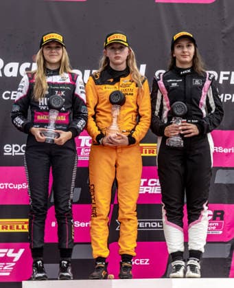 Ella Hakkinen (middle), the daughter of former Finnish race car driver and Formula 1 driver Mika Hakkinen and his wife Marketa, won the F4 CEZ RACE in Most, on August 1st, 2026. On the left is Alexia Danielsson (SWE), who placed second; on the right is Michalina Sabaj (POL), who placed third. (CTKxPhoto VojtechxHajek) CTKPhotoF202608010028401  CTKPhotoF202608010028401