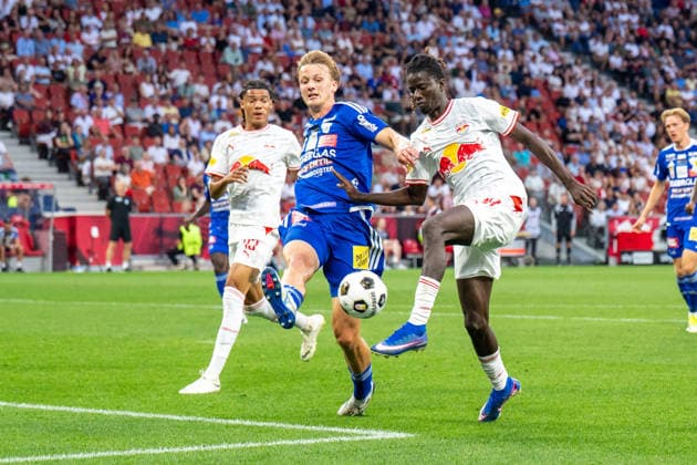 SOCCER - BL, RBS vs Hartberg SALZBURG,AUSTRIA,01.AUG.26 - SOCCER - ADMIRAL Bundesliga, Red Bull Salzburg vs TSV Hartberg. Image shows Enrique Aguilar (RBS), Konstantin Schopp (Hartberg) and Gaoussou Diakite (RBS).  GEPAxpictures xWolfgangxKofler