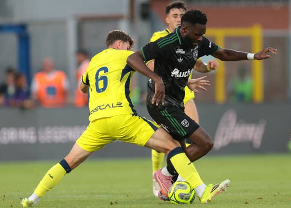Como, Italy, 1st August 2026. Pau Badenes Navarro of Villarreal CF challenges Odsonne Edouard of Racing Club de Lens during the Villarreal CF vs Racing Club de Lens Como Cup 2026 Final, Pre Season Friendly match at Stadio Giuseppe Sinigaglia, Como. Picture credit should read: Jonathan Moscrop Sportimage EDITORIAL USE ONLY. No use with unauthorised audio, video, data, fixture lists, club league logos or live services. Online in-match use limited to 120 images, no video emulation. No use in betting, games or single club league player publications. SPI_006_JM_VILLARREAL_LENS SPI-4891-0006