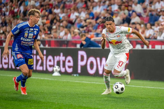 SOCCER - BL, RBS vs Hartberg SALZBURG,AUSTRIA,01.AUG.26 - SOCCER - ADMIRAL Bundesliga, Red Bull Salzburg vs TSV Hartberg. Image shows Fabian Wilfinger (Hartberg) and Enrique Aguilar (RBS).  GEPAxpictures xWolfgangxKofler