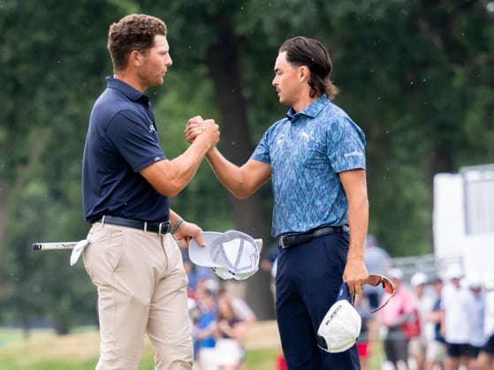 DETROIT, MI - AUGUST 01: Rickie Fowler (USA) and Michael Brennan (USA) shake hands after completing the third round of the Rocket Classic at Detroit Golf Club on August 01, 2026, in Detroit, Michigan. (Photo by Joseph Weiser Icon Sportswire) GOLF: AUG 01 PGA, Golf Herren Rocket Classic EDITORIAL USE ONLY Icon2608010843