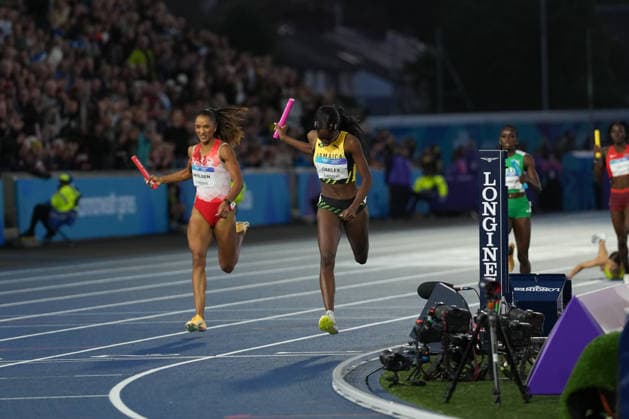 RECORD DATE NOT STATED 1st August 2026; Glasgow, Scotland; 2026 Commonwealth Games, Day Ten; Dejanae Oakley of Jamaica crosses the finish line and wins the 4 x 400m mixed relay final AlecxBrown