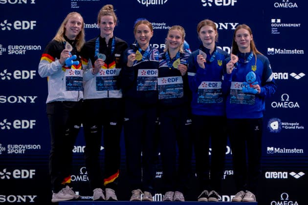 France, Paris, Centre Aquatique Olympique Metropole du Grand Paris, 01.08.2026, European Aquatics Championships Artistic Swimming, Day 1, Men™s 1m Springboard Final, Victory Ceremony Women™s 10m Platform Synchro, Silver Medal Winners Pauline Alexandra Pfeif and Elena Wassen of Germany, Gold Medal Winners Maisie Bond and Lois Toulson of Great Britan and Bronze Medal Winenrs Kseniia Bailo and Sofiia Vystavkina of Ukraine, Photo by Eibner Pressefoto Tino Henschel European Aquatics Championships Artistic Swimming, Day 1, Men™s 1m Springboard Final Paris *** France, Paris, Centre Aquatique Olympique Metropole du Grand Paris, August 1, 2026, European Aquatics Championships – Artistic Swimming, Day 1, Men’s 1-meter Springboard Final, Victory Ceremony for Women’s 10-meter Platform Synchronized Diving, Silver medalists Pauline Alexandra Pfeif and Elena Wassen of Germany, gold medalists Maisie Bond and Lois Toulson of Great Britain, and bronze medalists Kseniia Bailo and Sofiia Vystavkina of Ukraine, Photo by Eibner Pressefoto Tino Henschel European Aquatics Championships Artistic Swimming, Day 1, Men’s 1m Springboard Final, Paris Copyright: xEibnerxPressefotox