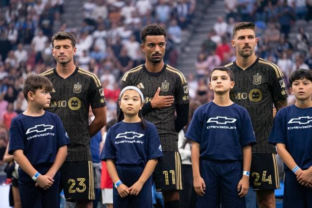 VANCOUVER, CANADA - AUGUST 1: Yevhen Cheberko of Los Angeles FC, Timothy Tillman of Los Angeles FC and Ryan Hollingshead of Los Angeles FC stand during national anthems before the Major League Soccer match between Vancouver Whitecaps FC and Los Angeles at BC Place Stadium on August 1, 2026 in Vancouver, British Columbia, Canada.  Copyright: xAmyxElle SPPx Sportspressphoto_SPR199336