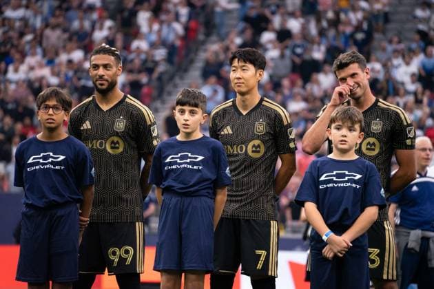 VANCOUVER, CANADA - AUGUST 1: Denis Bouanga of Los Angeles FC, Heung Min Son of Los Angeles FC and Yevhen Cheberko of Los Angeles FC stand during national anthems before the Major League Soccer match between Vancouver Whitecaps FC and Los Angeles at BC Place Stadium on August 1, 2026 in Vancouver, British Columbia, Canada.  Copyright: xAmyxElle SPPx Sportspressphoto_SPR199343