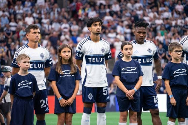VANCOUVER, CANADA - AUGUST 1: Andres Cubas of Vancouver Whitecaps FC, Jeevan Badwal of Vancouver Whitecaps FC and Edier Ocampo of Vancouver Whitecaps FC stand during national anthems before the Major League Soccer match between Vancouver Whitecaps FC and Los Angeles FC at BC Place Stadium on August 1, 2026 in Vancouver, British Columbia, Canada.  Copyright: xAmyxElle SPPx Sportspressphoto_SPR199338