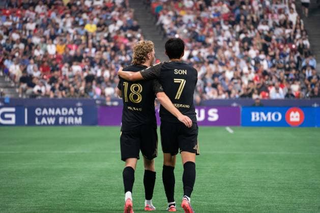 VANCOUVER, CANADA - AUGUST 1: Jacob Shaffelburg of Los Angeles FC and Heung Min Son of Los Angeles FC hugs after scoring their first goal during the Major League Soccer match between Vancouver Whitecaps FC and Los Angeles at BC Place Stadium on August 1, 2026 in Vancouver, British Columbia, Canada.  Copyright: xAmyxElle SPPx Sportspressphoto_SPR199359