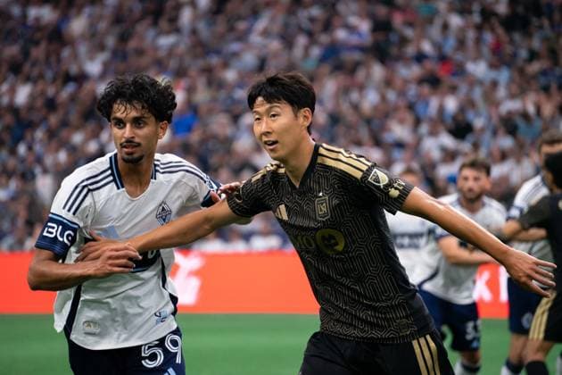VANCOUVER, CANADA - AUGUST 1: Jeevan Badwal of Vancouver Whitecaps FC and Heung Min Son of Los Angeles FC gets ready for a corner kick during the Major League Soccer match between Vancouver Whitecaps FC and Los Angeles FC at BC Place Stadium on August 1, 2026 in Vancouver, British Columbia, Canada.  Copyright: xAmyxElle SPPx Sportspressphoto_SPR199378