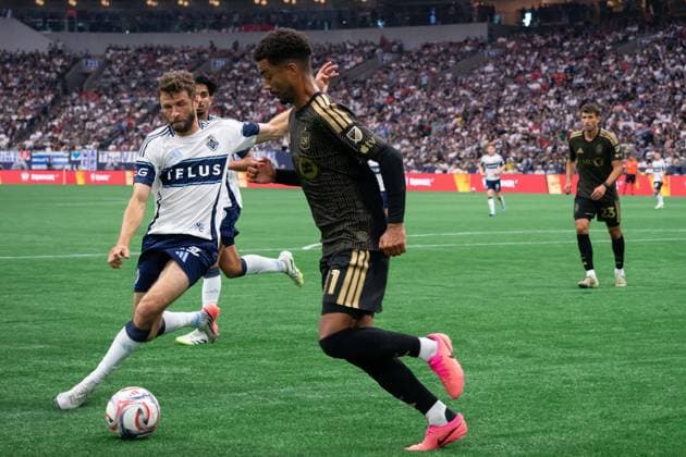 VANCOUVER, CANADA - AUGUST 1: Thomas Muller of Vancouver Whitecaps FC and Timothy Tillman of Los Angeles FC battles for the ball during the Major League Soccer match between Vancouver Whitecaps FC and Los Angeles FC at BC Place Stadium on August 1, 2026 in Vancouver, British Columbia, Canada.  Copyright: xAmyxElle SPPx Sportspressphoto_SPR199379