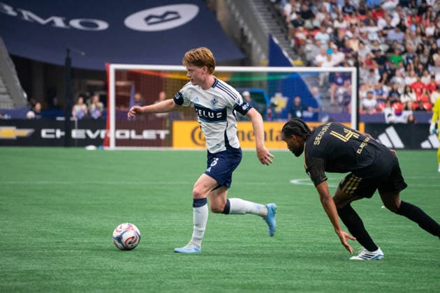 VANCOUVER, CANADA - AUGUST 1: Oliver Larraz of Vancouver Whitecaps FC controls the ball while Eddie Segura of Los Angeles FC follows closely during the Major League Soccer match between Vancouver Whitecaps FC and Los Angeles FC at BC Place Stadium on August 1, 2026 in Vancouver, British Columbia, Canada.  Copyright: xAmyxElle SPPx Sportspressphoto_SPR199382