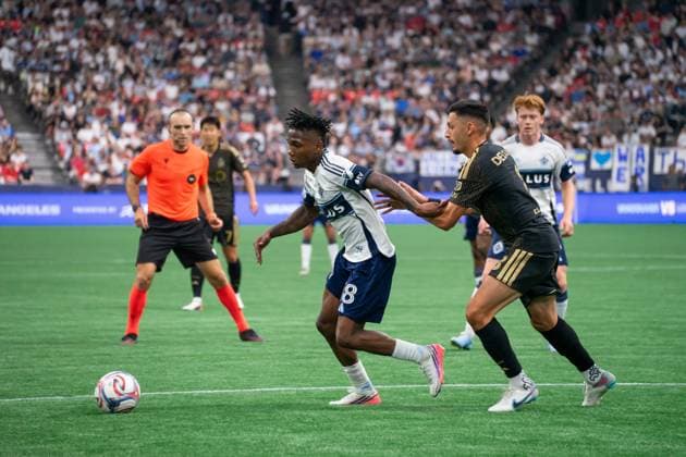 VANCOUVER, CANADA - AUGUST 1: Edier Ocampo of Vancouver Whitecaps FC controls the ball while Mark Delgado of Los Angeles FC holds his arm and follows closely during the Major League Soccer match between Vancouver Whitecaps FC and Los Angeles FC at BC Place Stadium on August 1, 2026 in Vancouver, British Columbia, Canada.  Copyright: xAmyxElle SPPx Sportspressphoto_SPR199391