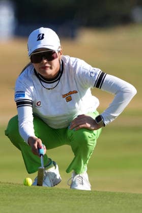 Golf: Women s British Open Shiho Kuwaki of Japan lines up a putt on the 14th hole during the third round of the Women s British Open golf tournament on Aug. 1, 2026, at Royal Lytham &amp; St Annes Golf Club in Lytham St Annes, England.  A14AA0005624751P
