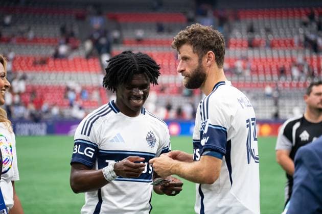 VANCOUVER, CANADA - AUGUST 1: Thomas Muller of Vancouver Whitecaps FC and Emmanuel Sabbi of Vancouver Whitecaps FC autographs trading cards after the Major League Soccer match between Vancouver Whitecaps FC and Los Angeles FC at BC Place Stadium on August 1, 2026 in Vancouver, British Columbia, Canada.  Copyright: xAmyxElle SPPx Sportspressphoto_SPR199406