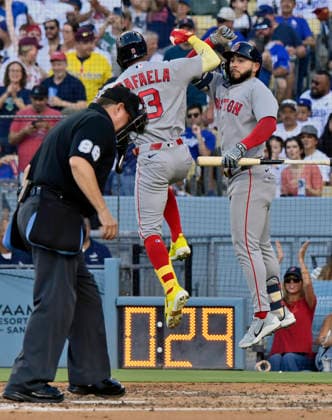 Boston Red Sox center fielder Ceddanne Rafaela (L) celebrates with Caleb Durbin after hitting a solo home run against Los Angeles Dodger starting pitcher Yoshinobu Yamamoto in the third inning at Dodger Stadium in Los Angeles on Saturday, August 1, 2026. It was the second multi-homer game of Rafaela s career.  LAP2026080104 JIMxRUYMEN