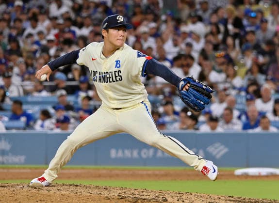 Los Angeles Dodgers starting pitcher Yoshinobu Yamamoto winds up to deliver in the eighth inning at Dodger Stadium against the Boston Red Sox in Los Angeles on Saturday, August 1, 2026.  LAP2026080113 JIMxRUYMEN