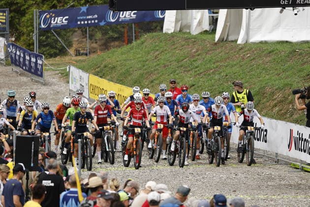 02.08.2026, Monteceneri, Monte Ceneri, 2026 UEC MTB European Championship, EM, Europameisterschaft XCO Women U23 s Final (cross country olympic) Fiona Schibler 2 (SUI), Valentina Corvi 1 (ITA), Marta Cano Espinosa 3 (ESP), Katrin Embacher 4 (AUT), Monique Halter 6 (SUI), Anina Hutter 7 (SUI) and Elina Benoit 8 (SUI) sharing the first row at the green lights Monteceneri Monte Ceneri Ticino Switzerland *** August 2, 2026, Monteceneri, Monte Ceneri, 2026 UEC MTB European Championship XCO Women U23 Final, Cross-Country Olympic: Fiona Schibler 2 SUI, Valentina Corvi 1 ITA, Marta Cano Espinosa 3 ESP, Katrin Embacher 4 AUT, Monique Halter 6 SUI, Anina Hutter 7 SUI, and Elina Benoit 8 SUI sharing the front row at the green lights in Monteceneri, Monte Ceneri, Ticino, Switzerland Copyright: xJustPictures.ch FrancescoxMinghettix jp-en-FrMi-_NG_0138