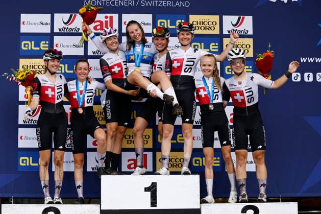 Sport Bilder des Tages 02.08.2026, Monteceneri, Monte Ceneri, 2026 UEC MTB European Championship, EM, Europameisterschaft XCO Women U23 s Final (cross country olympic) all the U23 Swiss rider celebrating the full Swiss Podium of Fiona Schibler 2 (SUI) 2nd place and silver medal, Anina Hutter 7 (SUI) 1st place, European Champion and gold medal and Elina Benoit 8 (SUI) 3rd place and bronze medal Monteceneri Monte Ceneri Ticino Switzerland *** August 2, 2026, Monteceneri, Monte Ceneri, 2026 UEC MTB European Championship XCO Women U23 Final—cross-country Olympic—all the Swiss U23 riders celebrating the all-Swiss podium: Fiona Schibler (2 SUI) in 2nd place and winning the silver medal, Anina Hutter (7 SUI) in 1st place, European Champion and gold medalist, and Elina Benoit (8 SUI) in 3rd place and bronze medalist. Monteceneri, Monte Ceneri, Ticino, Switzerland Copyright: xJustPictures.ch FrancescoxMinghettix jp-en-FrMi-_NG_1393