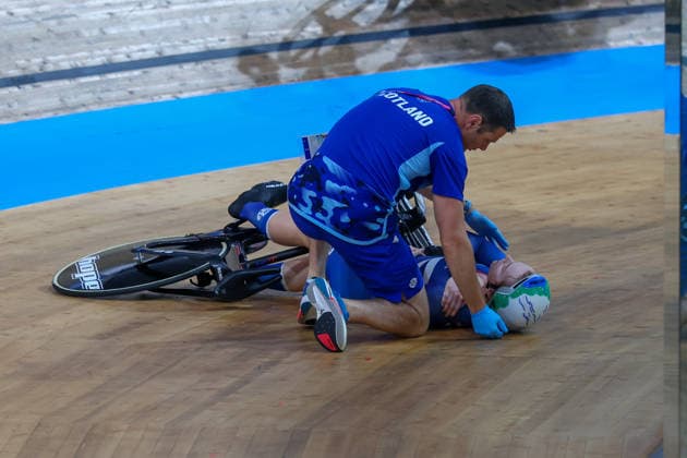 2nd August 2026; Glasgow, Scotland; 2026 Commonwealth Games, Final Day; Sir Chris Hoy Velodrome, Track cycling, Rad, Radsport, Bahnrad, Bahn Sir Chris Hoy Velodrome, Track Cycling, Womens Keirin First Round, Lauren Bell (SCO) crashes out of heat three and receives assistance from her coaching staff RogerxEvans