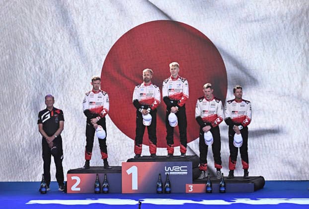 LKS 20260802 Winner driver Sami Pajari and co-driver Marko Salminen of Finland, Oliver Solberg (not in the pic) and co-driver Elliott Edmondson of Sweden placed 2nd and Elfyn Evans and co-driver Scott Martin of GBR placed 3rd and the team manager of Toyota Juha Kankkunen (L) celebrate on the podium at the WRC, Motorsport Rallye, WM Rally Finland in Jyväskylä, Finland on August 2, 2026. - RONI REKOMAA Jämsä Finland Jd4BoaHRzZY  Copyright: xRonixRekomaax Jd4BoaHRzZY