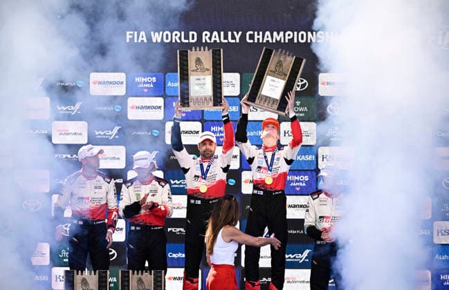 LKS 20260802 Winner driver Sami Pajari and co-driver Marko Salminen of Finland, Oliver Solberg and co-driver Elliott Edmondson of Sweden placed 2nd and Elfyn Evans and co-driver Scott Martin of GBR placed 3rd celebrate on the podium at the WRC, Motorsport Rallye, WM Rally Finland in Jyväskylä, Finland on August 2, 2026. - RONI REKOMAA Jämsä Finland EhUQvniz_4c  Copyright: xRonixRekomaax EhUQvniz_4c