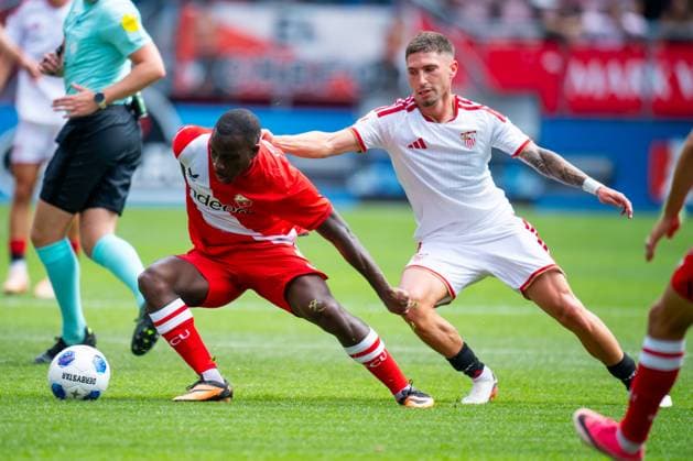 UTRECHT , 02-08-2026 , Stadium Galagenwaard , season 2026 2027 , Dutch Pre-season football , match between FC Utrecht and Sevilla , picture shows FC Utrecht player Yoann Cathline Sevilla player Jose Angel Carmona Utrecht - Sevilla (friendly)  x205403124x Copyright: