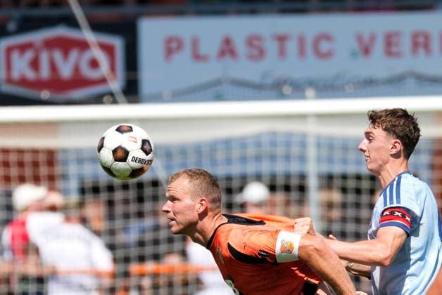 VOLENDAM , 13-02-2026 , Kras Stadium, season 2026 2027 , Pre season footbal . Match between FC Volendam and Ajax . Picture shows FC Volendam player Henk Veerman and Ajax player Youri Baas Volendam - Ajax (friendly  x205404438x Copyright:
