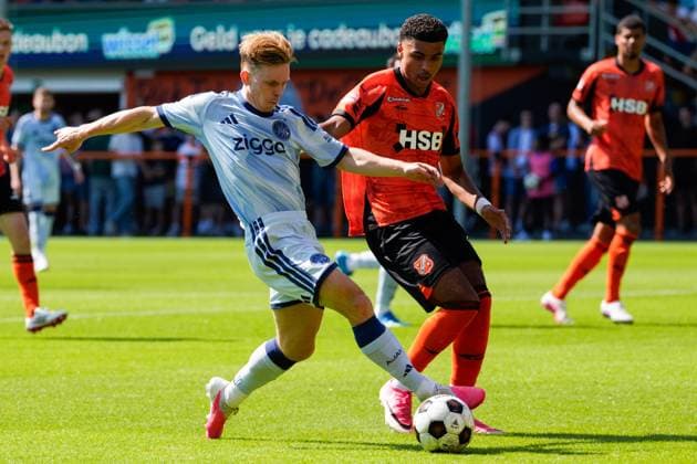 VOLENDAM , 13-02-2026 , Kras Stadium, season 2026 2027 , Pre season footbal . Match between FC Volendam and Ajax . Picture shows Ajax player Oliver Edvardsen and FC Volendam player Precious Ugwu Volendam - Ajax (friendly  x205404440x Copyright: