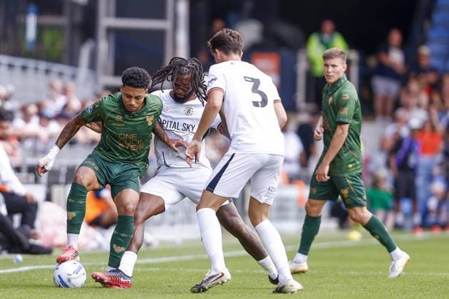 LUTON , 02-08-2026 , Kenilworth Road , season 2026 2027 , Dutch Pre-season football . friendly match between Luton Town and Go Ahead Eagles, final result 0-1, GA Eagles player Richonell Margaret Luton FC player Kasey Polner Luton Town - Go Ahead Eagles (friendly)  x205405979x Copyright: