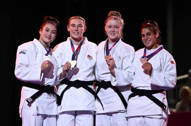 COM26 JUDO, Silver medalist Maria Swan of Australia, Gold medalist Emma Reid of England, and Bronze medalist Coralie Godbout of Canada pose during the medal ceremony for the Women s Judo -78kg during the Glasgow 2026 Commonwealth Games at SEC Centre Hall 4 in Glasgow, Scotland, Sunday, August 02 , 2026. ( NO ARCHIVING, EDITORIAL USE ONLY Glasgow Scotland United Kingdom  Copyright: xJOELxCARRETTx 20260803175621630933