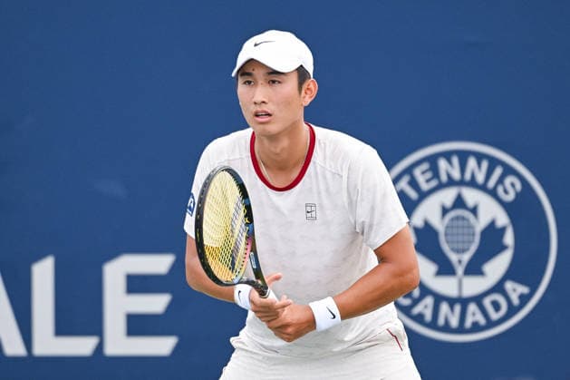 MONTREAL, QC - AUGUST 02: Juncheng Shang (CHN) waits for service during a first round match at National Bank Open on August 02, 2026 at IGA Stadium in Montreal, QC (Photo by David Kirouac Icon Sportswire) TENNIS: AUG 02 National Bank Open EDITORIAL USE ONLY Icon26080203426