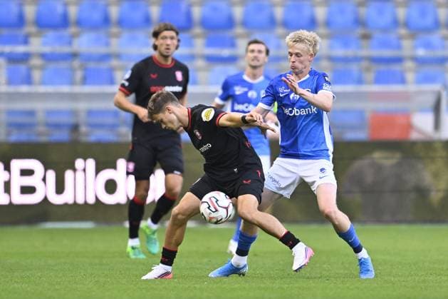 Twente s Krzysztof Kurowski and Genk s Jeppe Erenbjerg fight for the ball during a friendly soccer game between Racing Genk vs FC Twente, on Sunday 02 August 2026 in Genk, in preparation of the upcoming 2026-2027 Belgian first division soccer season. JOHAN EYCKENS JohanxEyckens  x182629150x