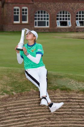 LYTHAM, ENGLAND - AUGUST 2: Winner, Shiho Kuwaki (JPN) kisses the AIG British Women™s Open Trophy after Round 4 at the 50th AIG Women™s Open Championship at the Royal Lytham and St Anne™s Golf Club, Lytham on August 2, 2026 in Lancashire, England The 50th AIG Women™s Open Championship