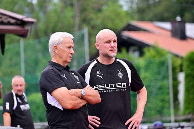 02.08.2026; Rottach-Egern; Fussball, Herren, Saison 2026 2027, Trainingslager Borussia Moenchengladbach Im Gespraech v. li. Rainer Bonhof (Praesident Gladbach), Rouven Schroeder (Head of Sports, Gladbach) DFL regulations prohibit any use of photographs as image sequences and or quasi-video. Stadion Am Birkenmoos Bayern Deutschland *** August 2, 2026 Rottach Egern Soccer, Men s, 2026–2027 season, Borussia Mönchengladbach training camp. In conversation (from left): Rainer Bonhof, President of Gladbach; Rouven Schröder, Head of Sports, Gladbach. DFL regulations prohibit any use of photographs as image sequences and or quasi-video. Am Birkenmoos Stadium, Bavaria, Germany