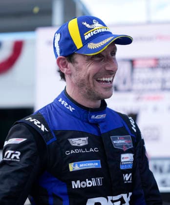 August 2, 2026, Elkhart Lake, Wisconsin, USA: Filipe Albuquerque, co-driver of the 10 Wayne Taylor Racing Cadillac GTP, celebrates in Victory Lane at the IMSA 6 hour sportscar race at Road America. Elkhart Lake USA - ZUMAd212 20260802_zsp_d212_045 Copyright: xRichardxDolex