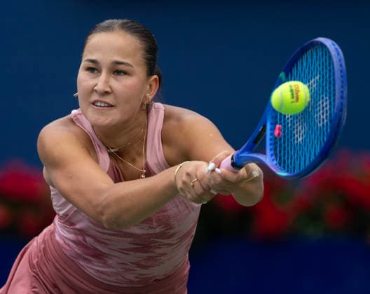 (260803) -- TORONTO, Aug. 3, 2026 -- Kamilla Rakhimova of Uzbekistan returns the ball during the first round of the women s singles match between Kamilla Rakhimova of Uzbekistan and Venus Williams of the United States at the 2026 National Bank Open tennis tournament in Toronto, Canada, Aug. 2, 2026. (Photo by Xinhua) (SP)CANADA-TORONTO-TENNIS-NATIONAL BANK OPEN-WOMEN S SINGLES ZouxZheng 