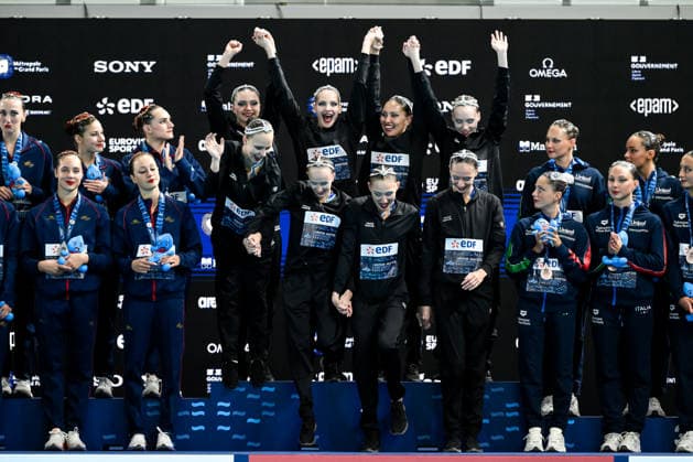 Neutral Athletes B, gold medal attend the medal ceremony of the artistic swimming Team Free Final during the European Aquatics Championships at the Olympic Aquatic Center in Paris (France), August 3, 2026. Andrea Staccioli