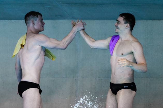 Lou Noel Guy Massenberg of Germany, Jonathan Gisbert Schauer of Germany celebrate after competing in the Diving 3m Springboard Synchro Men Final with the coaches during the European Aquatics Championships at the Olympic Aquatic Center in Paris (France), August 3, 2026. Andrea Staccioli