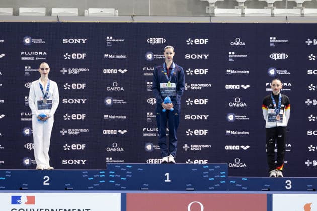 Women solo technical artistic swimming final European Aquatics Championships - Saint-Denis Silver medallist Neutral Athletes artistic swimmer Vasilina Khandoshka (L), gold medallist Spain s artistic swimmer Iris Tio Casas and bronze medallist Germany s artistic swimmer Klara Bleyer celebrate on the podium of the women’s solo technical artistic swimming final event during the LEN European Aquatics Championships, at the Olympic Aquatics Centre in Saint-Denis, northeastern suburbs of Paris, on August 4, 2026. Photo by Raphael Lafargue ABACAPRESS.COM Saint-Denis France  Copyright: xLafarguexRaphael ABACAx