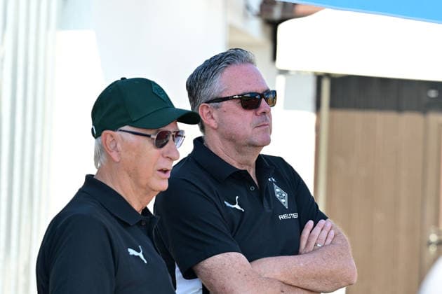 04.08.2026; Rottach-Egern; Fussball, Herren, Saison 2026 2027, Trainingslager Borussia Moenchengladbach Im Gespraech v. li. Rainer Bonhof (Praesident Gladbach) Markus Aretz (Geschaeftsfuehrer Gladbach) DFL regulations prohibit any use of photographs as image sequences and or quasi-video. Stadion Am Birkenmoos Bayern Deutschland *** August 4, 2026 Rottach Egern Soccer, Men s, 2026–2027 season, Borussia Mönchengladbach training camp. In conversation (from left): Rainer Bonhof, President of Gladbach; Markus Aretz, Managing Director of Gladbach. DFL regulations prohibit any use of photographs as image sequences and or quasi-video. Am Birkenmoos Stadium, Bavaria, Germany