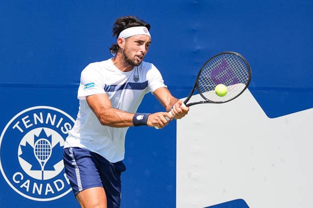 MONTREAL, QC - AUGUST 04: Thiago Augustin Tirante (ARG) returns the ball during a first round match at National Bank Open on August 04, 2026 at IGA Stadium in Montreal, QC (Photo by David Kirouac Icon Sportswire) TENNIS: AUG 04 National Bank Open EDITORIAL USE ONLY Icon26080403726