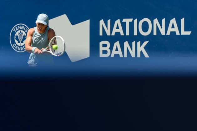 August 4, 2026, Toronto, Ontario, Canada: IGA SWIATEK of Poland returns the ball during her second-round match against Sara Bejlek of the Czech Republic at the National Bank Open, part of the Hologic WTA, Tennis Damen Tour, at Sobeys Stadium. Swiatek defeated Bejlek 6Ã¢â‚¬0, 6Ã¢â‚¬3 to advance to the third round. Toronto Canada - ZUMAr228 20260804_znp_r228_013 Copyright: xVasiliyxRyabykhx