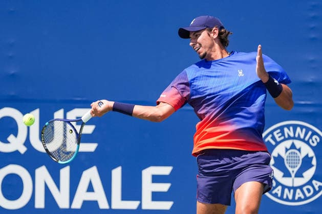 MONTREAL, QC - AUGUST 04: Alexei Popyrin (AUS) returns the ball during a first round match at National Bank Open on August 04, 2026 at IGA Stadium in Montreal, QC (Photo by David Kirouac Icon Sportswire) TENNIS: AUG 04 National Bank Open EDITORIAL USE ONLY Icon26080405726