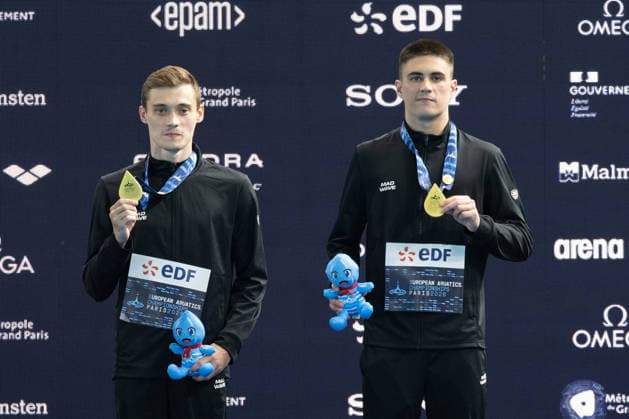 Men 10m platform synchro diving final European Aquatics Championships - Saint-Denis Gold medallists Neutral Athletes divers Nikita Shleikher and Ruslan Ternovoi celebrate on the podium following the men’s 10m platform synchro diving final event during the LEN European Aquatics Championships, at the Olympic Aquatics Centre in Saint-Denis, northeastern suburbs of Paris, on August 4, 2026. Photo by Raphael Lafargue ABACAPRESS.COM Saint-Denis France  Copyright: xLafarguexRaphael ABACAx